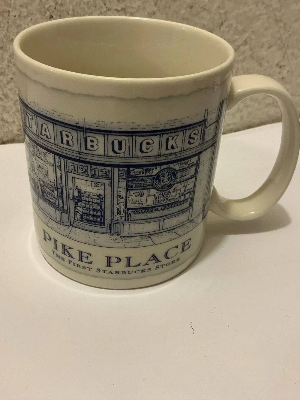 Starbucks Pike Place Ceramic Coffee Mug - Cream with Navy Blue Artwork